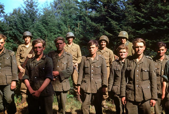 From D-Day until Christmas 1944, German prisoners of war were shipped off to American detention facilities at a rate of 30,000 per month. Above: Captured German troops, June 1944