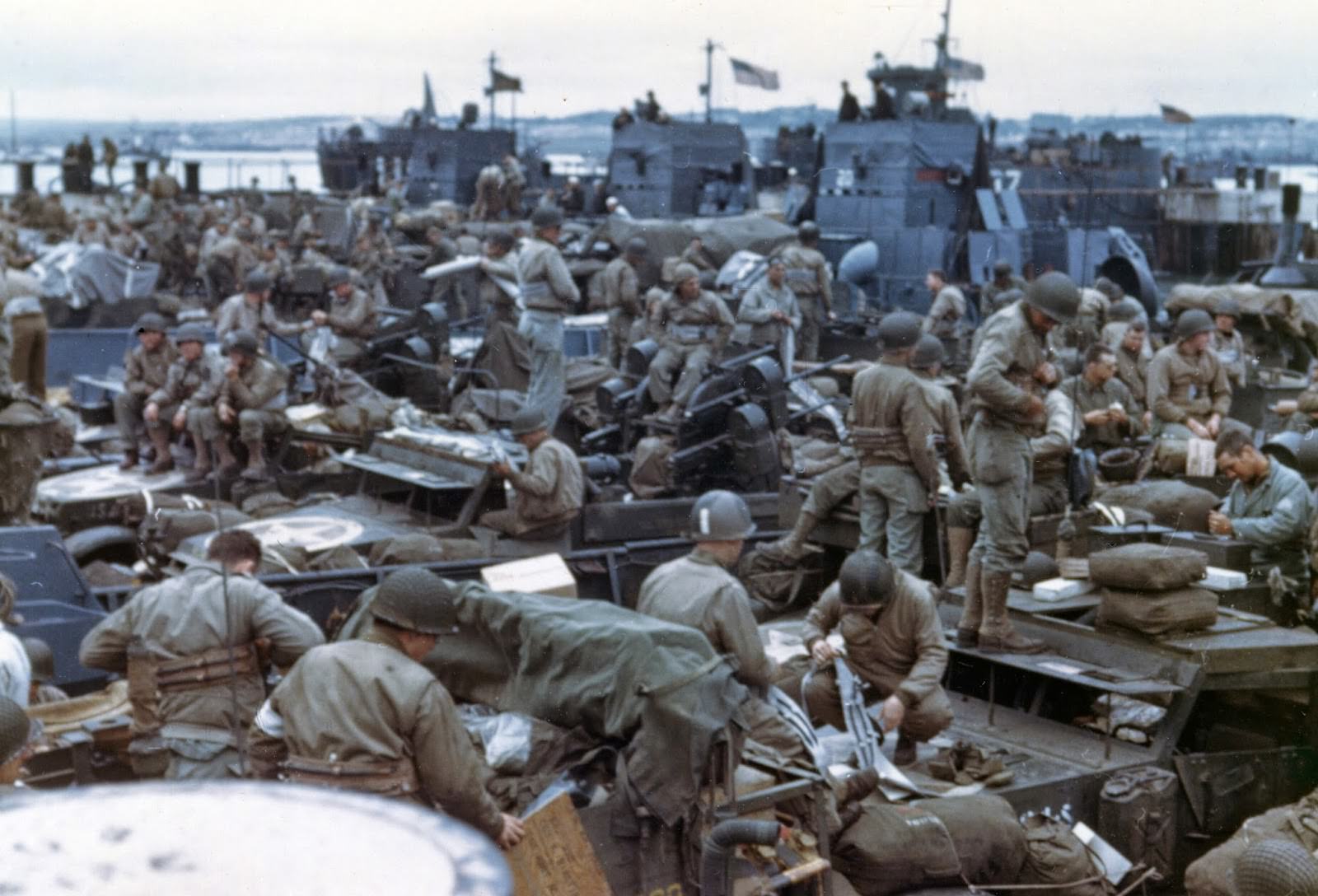 Men and equipment are massed together in landing craft in preparation for the big assault on the European continent. England.