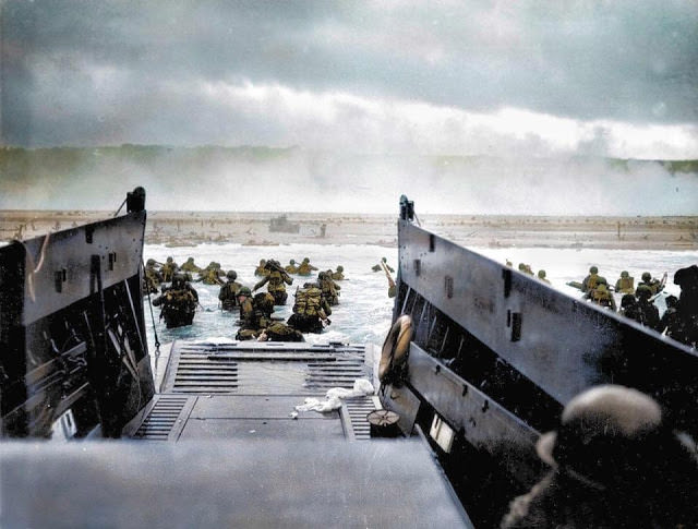 U.S. troops from the USS Joseph T. Dickman wait to disembark from their landing craft as they approach Utah Beach.