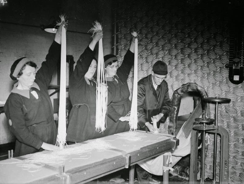 Cordite production at a Royal Naval armaments factory at Holton Heath, 1945.