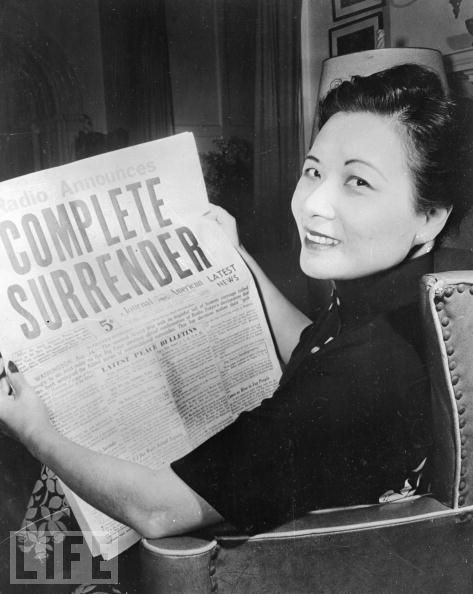 Soong Mei-Ling, the U.S.-educated wife of Chinese leader Chiang Kai-Shek, reads of Japan's surrender to the Allies in August 1945.