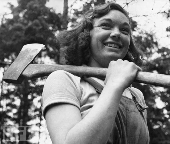 Cicely Clark is one of 4,900 members of The Women's Timber Corps, dubbed "lumberjills," at work in a timber camp in 1942 in Suffolk, England as part of the war effort.