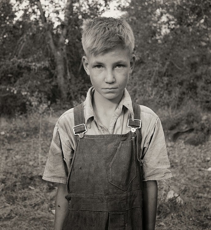 Migratory boy in squatter camp. Has come to Yakima Valley for the third year to pick hops