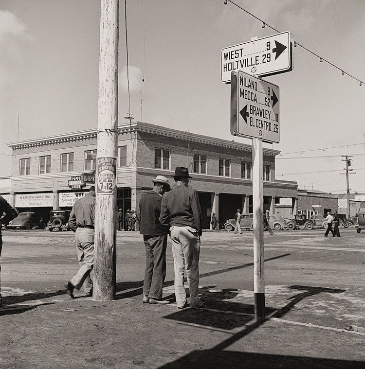 Calipatria, Imperial Valley. Idle pea pickers discuss prospects for work, California