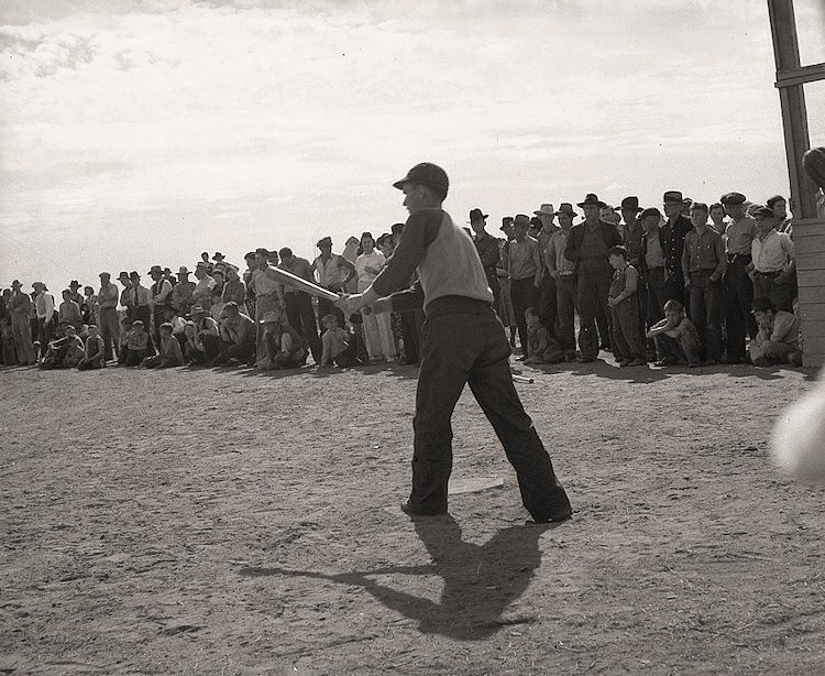 Ball game at Shafter migrant camp, California