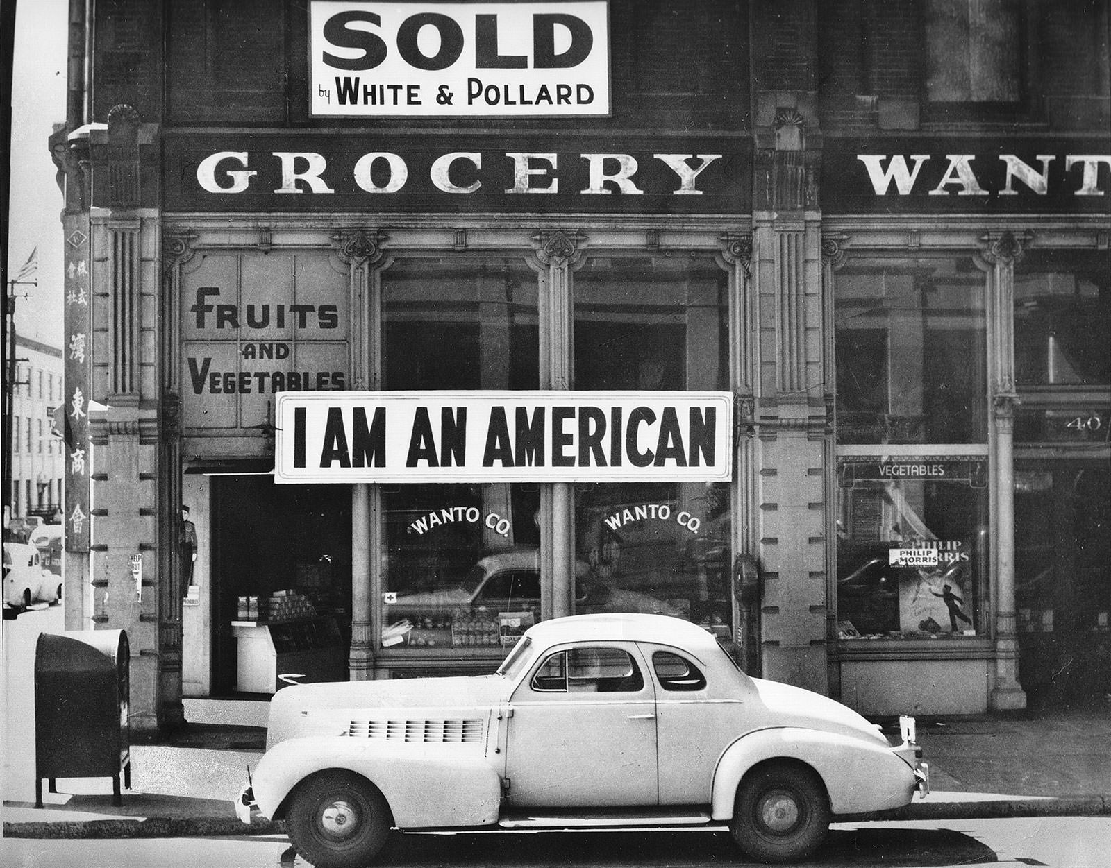 A store owner's response to anti-Japanese sentiment in the wake of the Pearl Harbor attack, Oakland, California, 1942