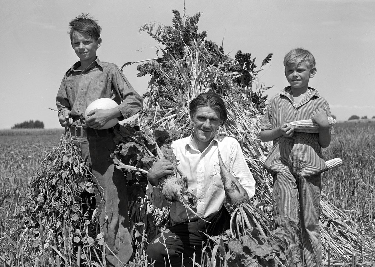 Ernest W. Kirk Jr. with his two sons on their farm near Ordway, Colorado, 1939