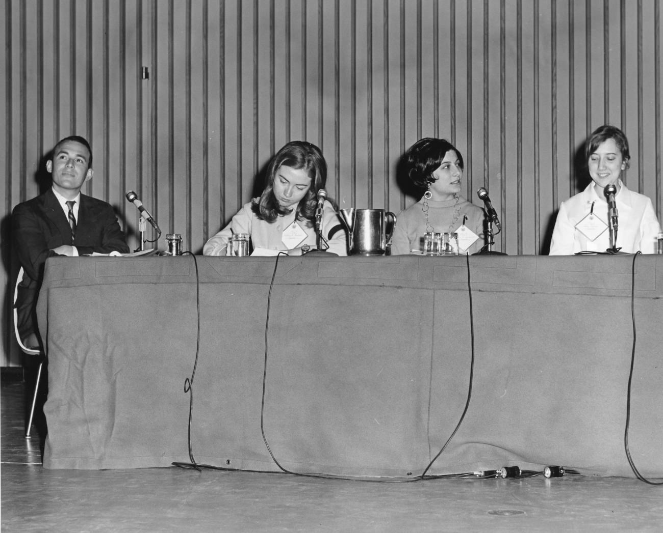Hillary joins students and a faculty member at the Wellesley College Alumnae Council Student Panel, 1968