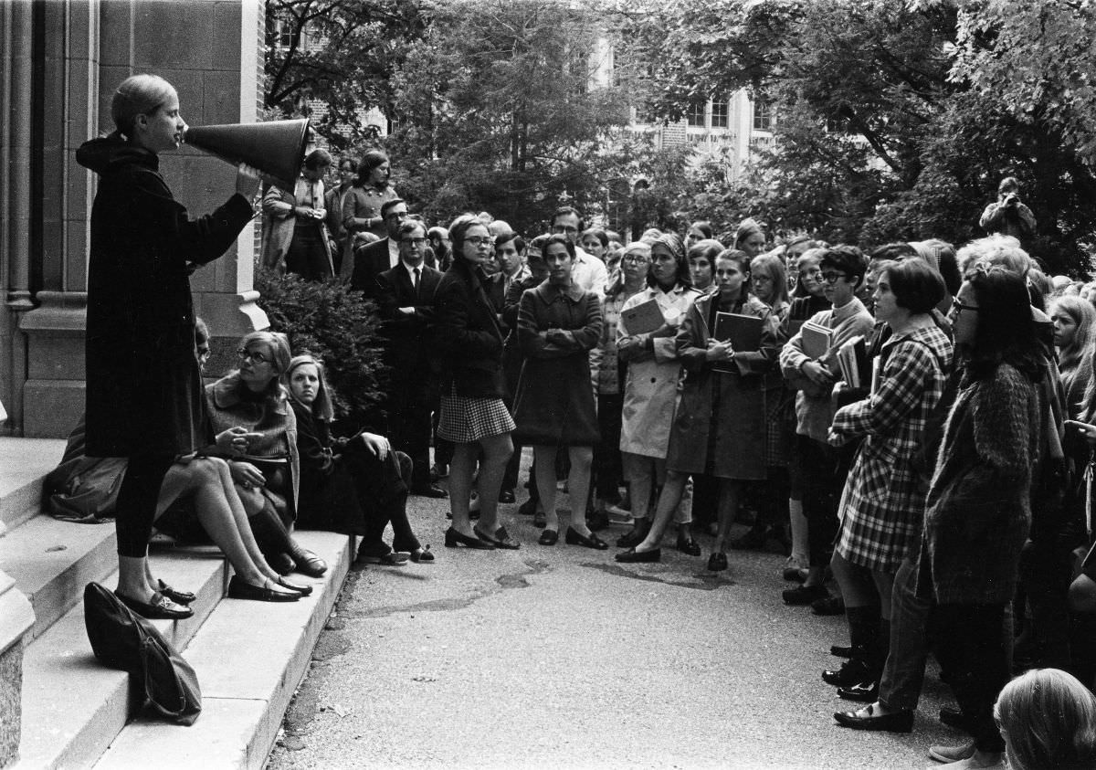 Hillary (center) attends a student rally at Wellesley College, 1968