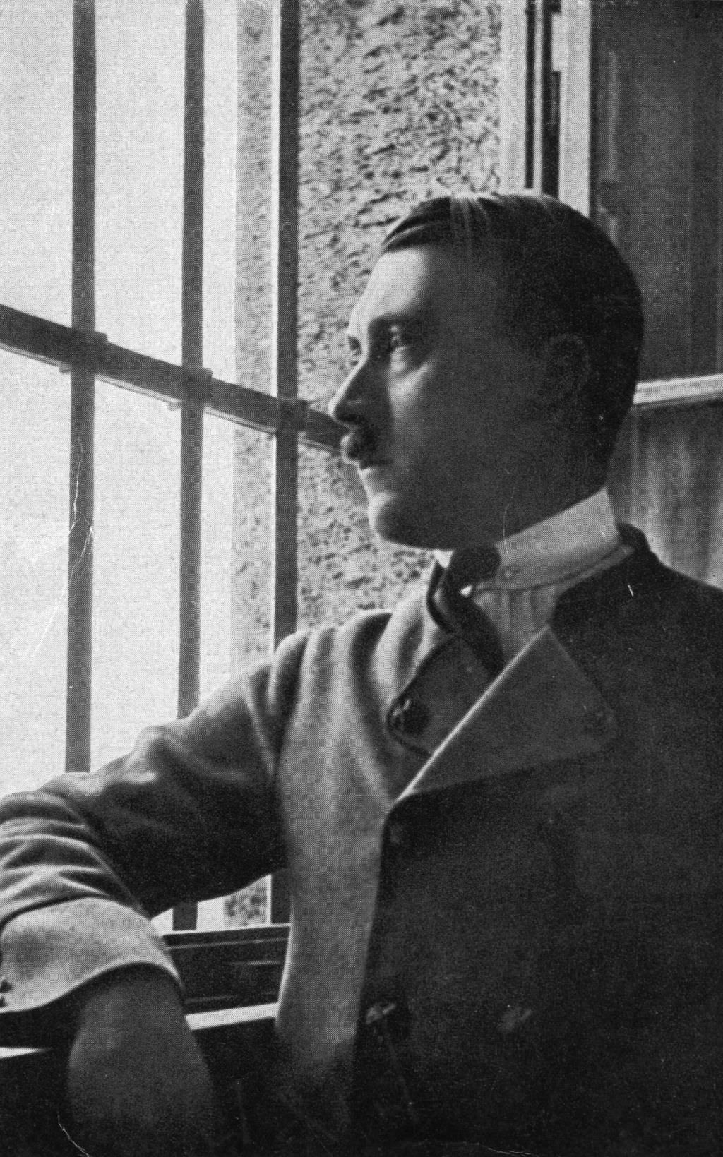 Adolf Hitler looking out of a barred window in Landsberg jail where he dictated his autobiography, Mein Kampf, 1924