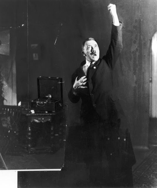 Hitler rehearsing his speech in front of a mirror, 1925