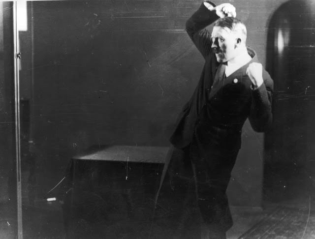Hitler rehearsing his speech in front of a mirror, 1925