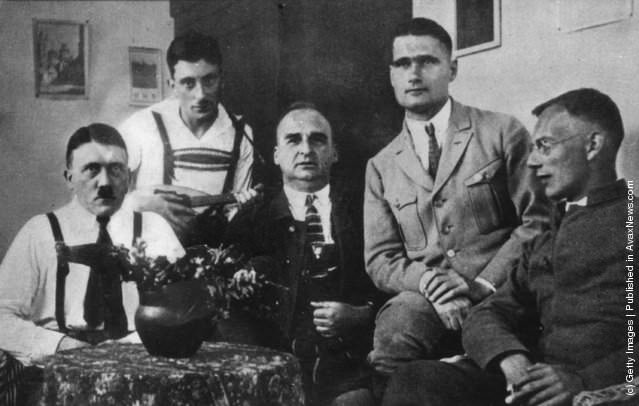 Adolf Hitler receives visitors, including Rudolf Hess (1894–1987), (second from right), during his imprisonment in Landsberg jail, 1924