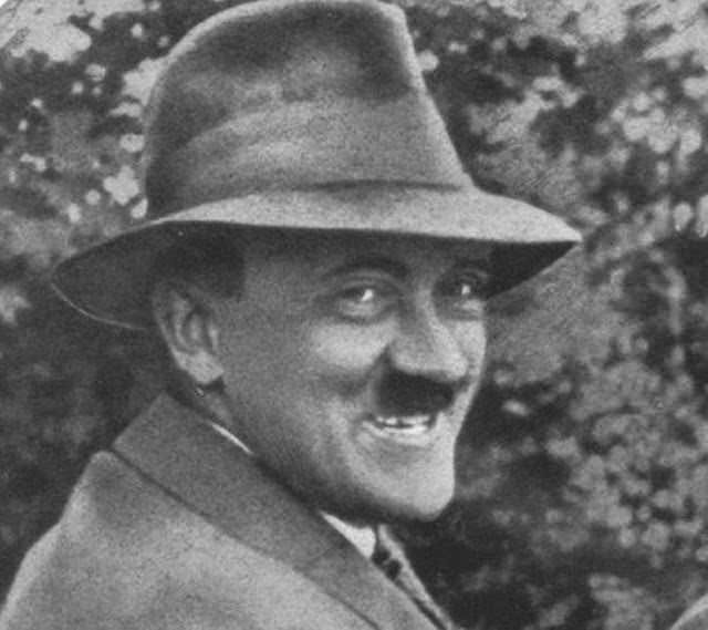 Adolf Hitler grinning inanely