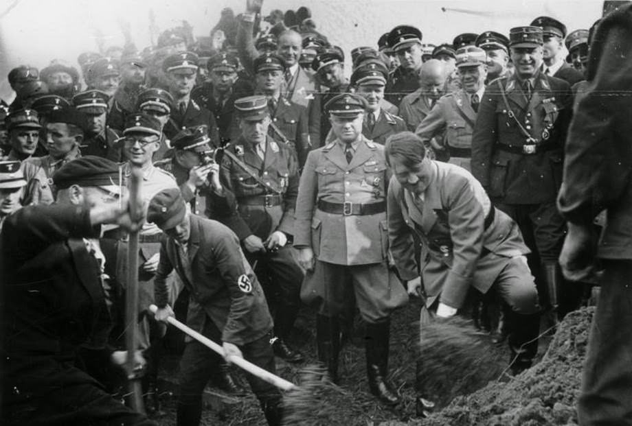 Hitler at a construction site of a new autobahn (highway).