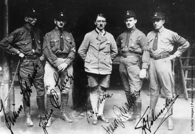 Adolf Hitler with members of the National Socialist German Workers' Party (left to right) Hitler's adjutant Schaub, Hitler's chauffeur Schreck, Hitler, Maurer and Schneider, 1929