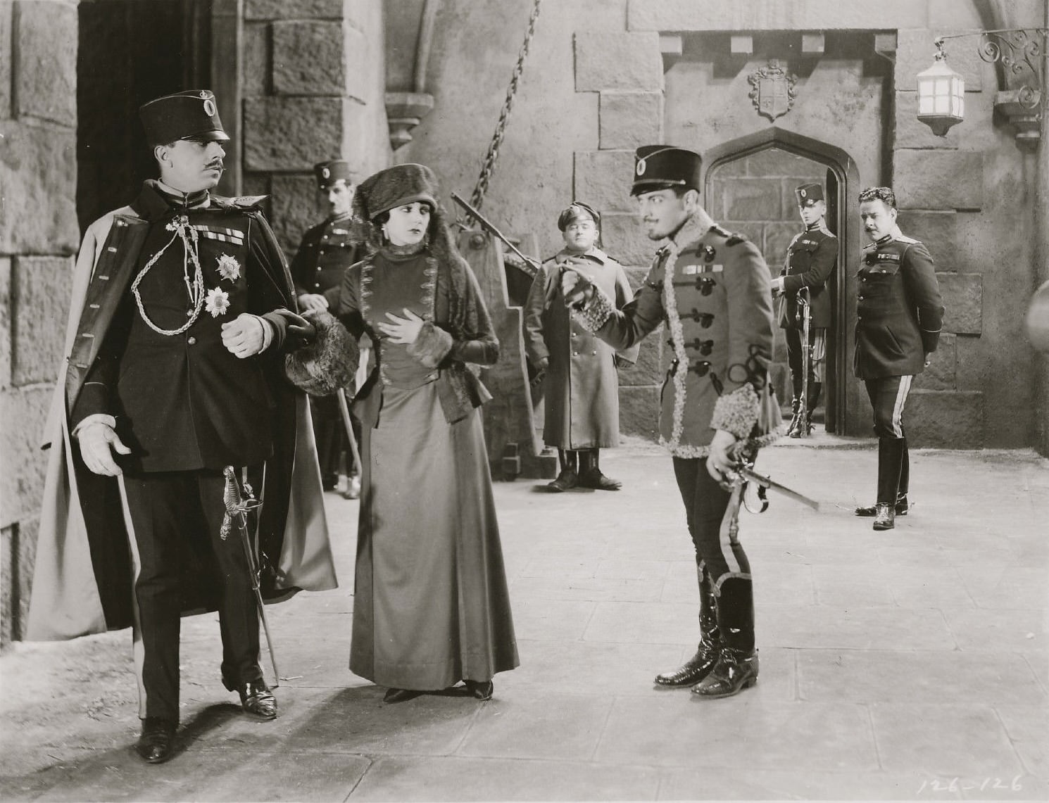 Barbara La Marr in "The Prisoner of Zenda", 1922 with with Stuart Holmes (on her right) and Ramon Novarro (on right in foreground)