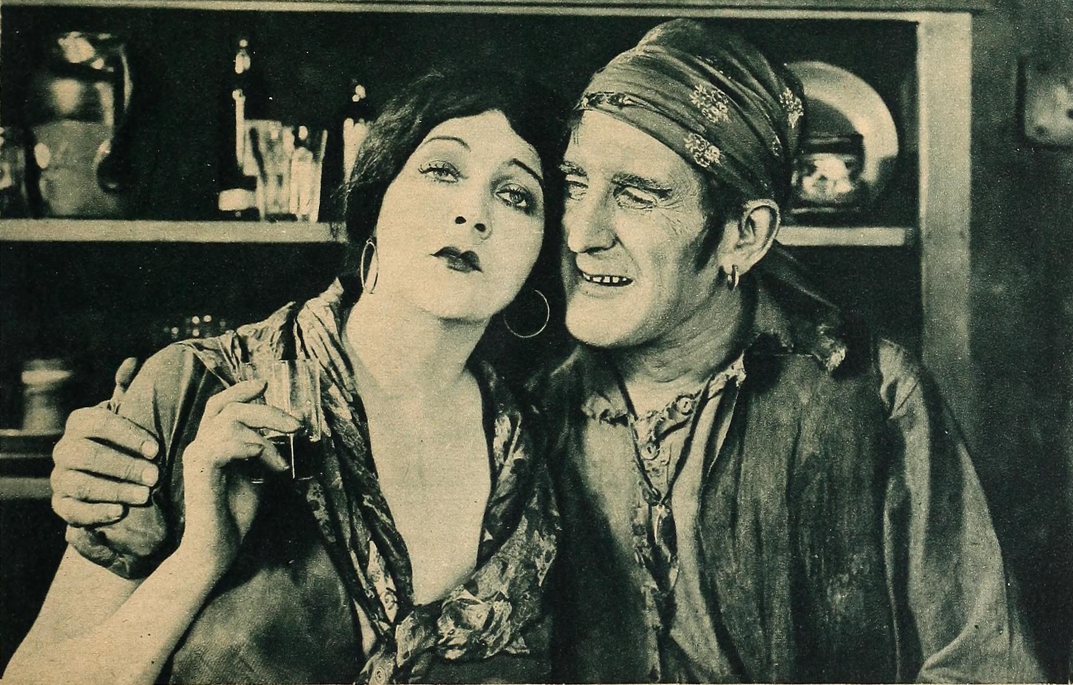 Barbara La Marr and William V. Mong in "Thy Name is Woman", 1924