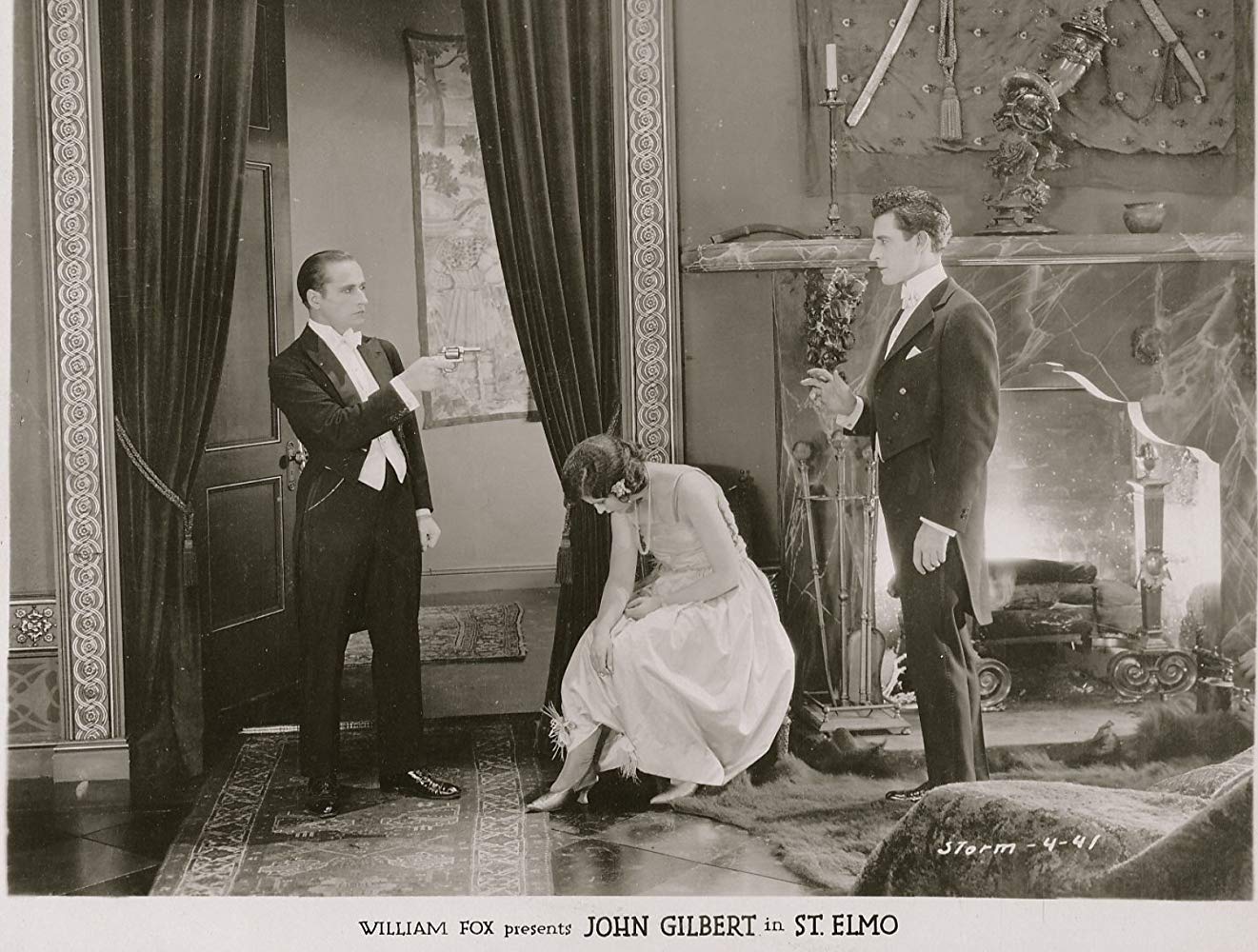 Barbara La Marr Warner Baxter and John Gilbert in "St. Elmo", 1923