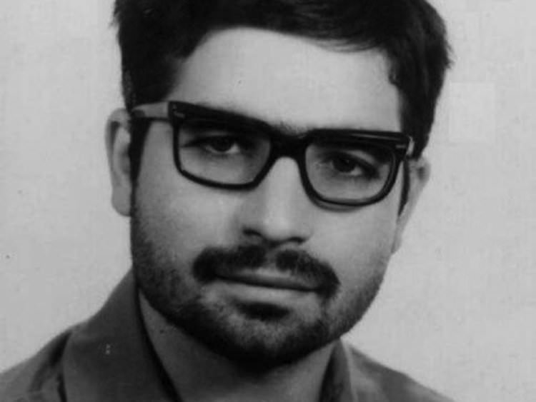 Iranian President Hassan Rouhani in a military service