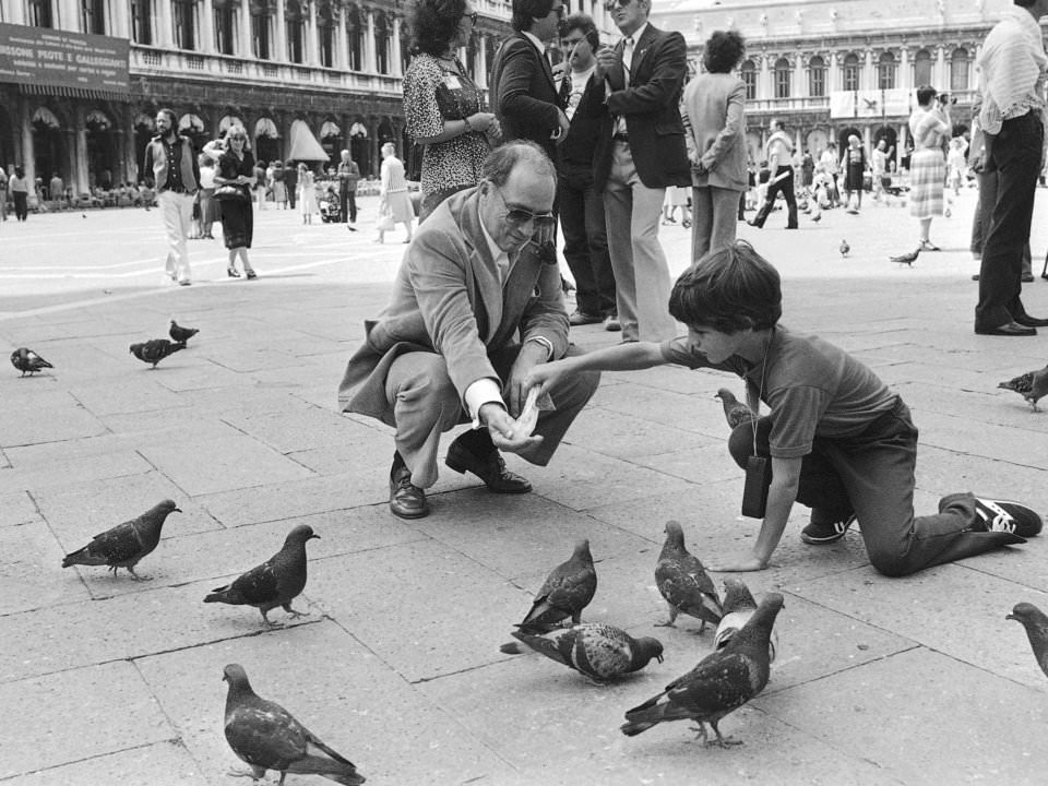 Eight-year-old Justin Trudeau feeds pigeons with his father, 1980