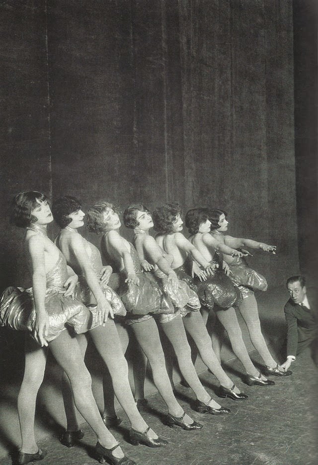 Erik Charell repeating with dancers in a music hall, Berlin, 1925.