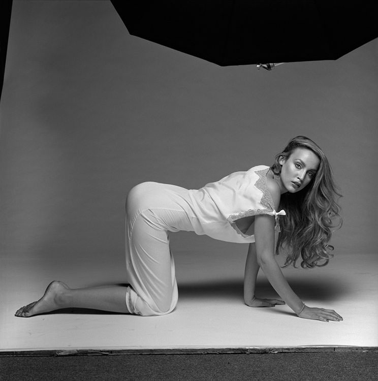 Jerry Hall poses for a lingerie shoot in a London studio, 1978