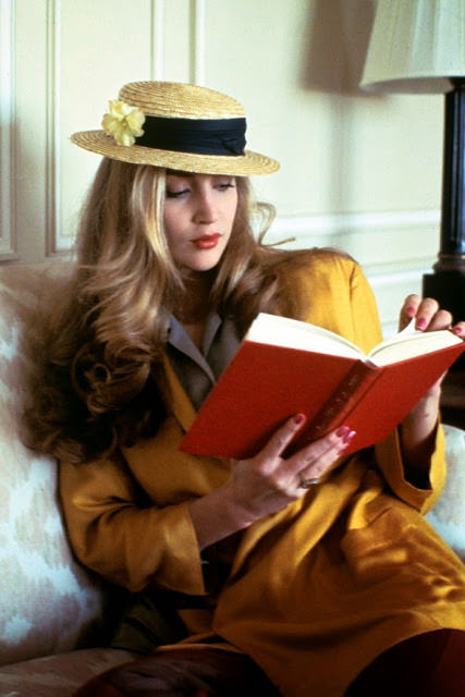 #52 Jerry Hall reading a book, 1975