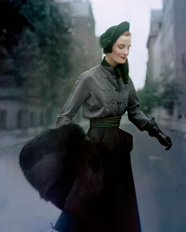 Wenda Parkinson wearing a Christian Dior hussar-style velvet-and-wool tailleur and black-fox muff in Paris, 1949