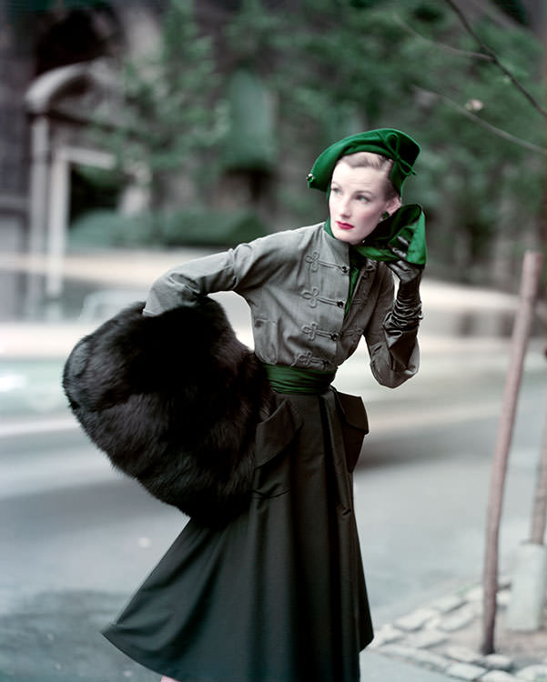 Wenda Parkinson wearing a Christian Dior hussar-style velvet-and-wool tailleur and fox muff in New York, 1949