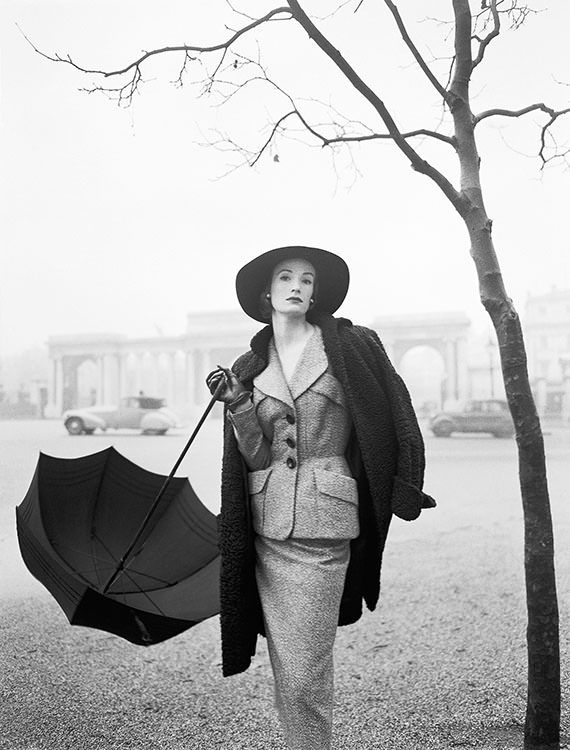 Wenda Parkinson wearing a tweed suit by Hardy Amies, near Rotten Row at Hyde Park Corner, London, 1951