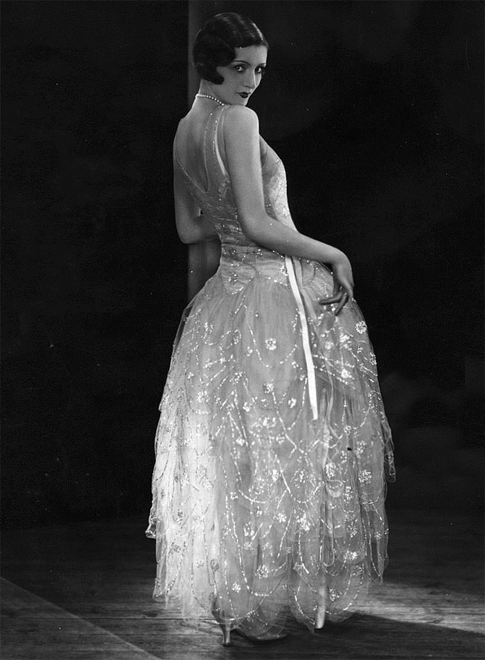 A model wearing a Norman Hartline evening gown, 1929