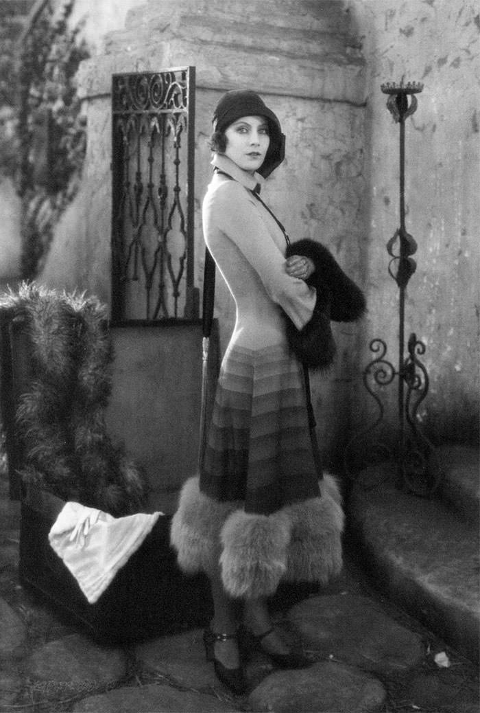 Greta Garbo, in movie the torrent, wearing adorable hat, and lovely dress, 1926