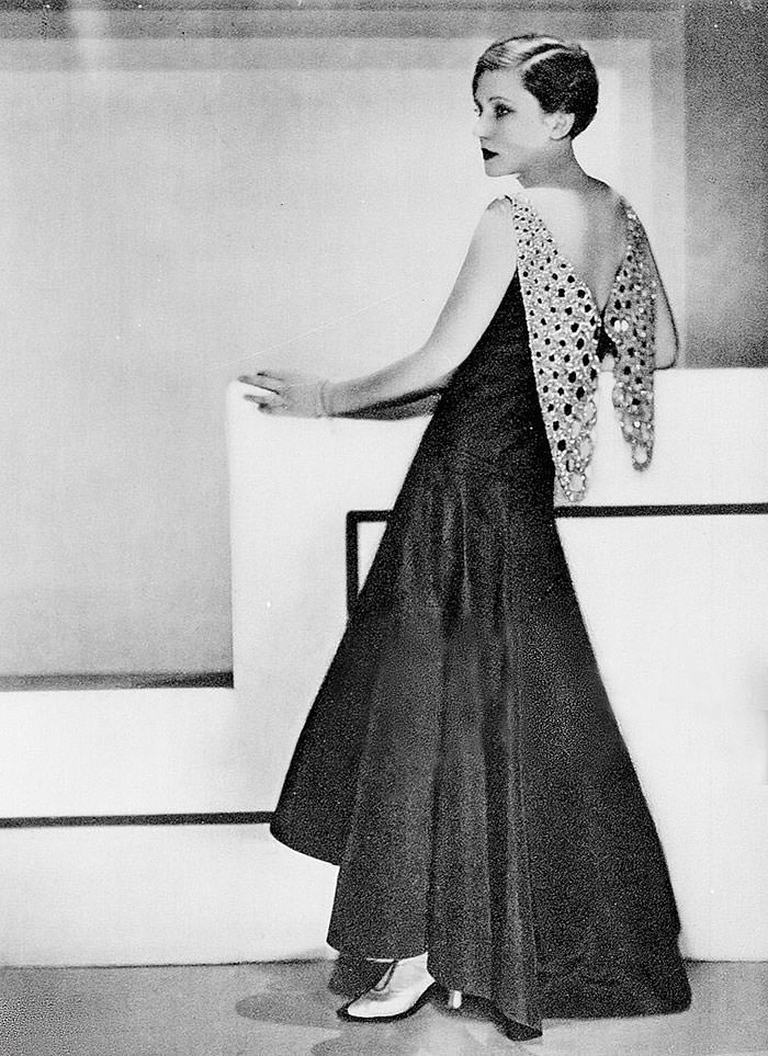 A Women Models A Dress of Jeanne Lanvin’s Black Fault, On 1929 In Paris, France
