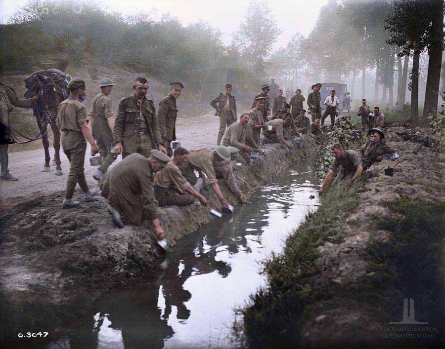 Canadian Filling their water Bottles ,etc Amiens, August 1918