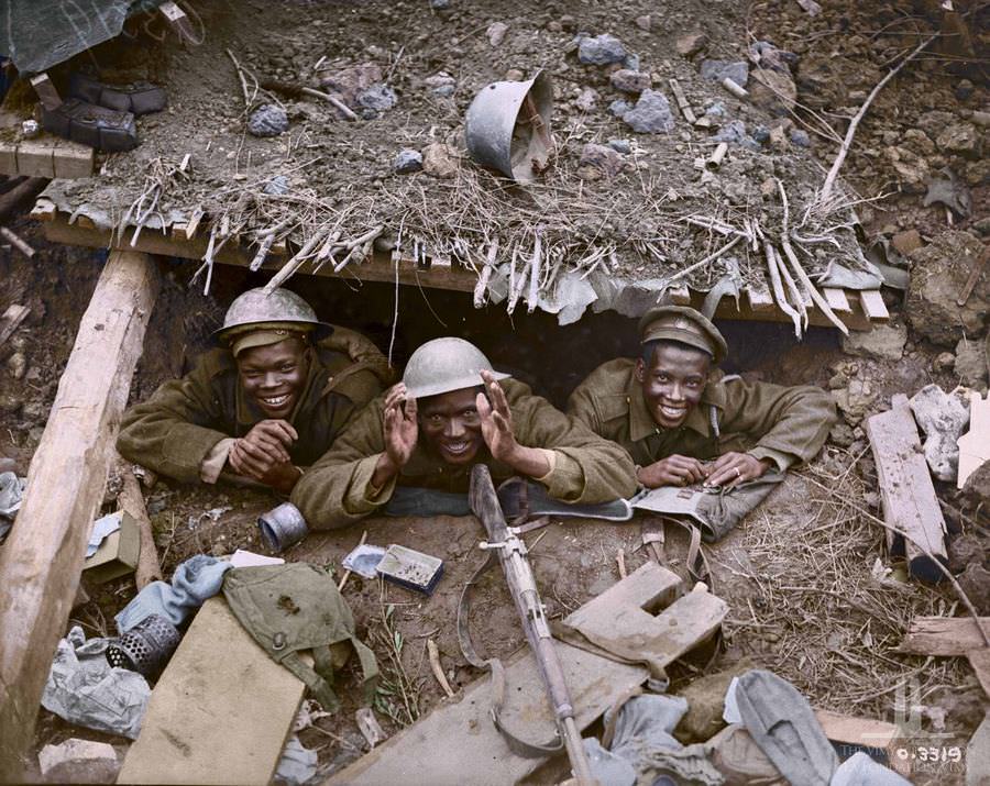 Three Canadian Soldiers In A German dug out captured during the Canadian advance east of arras