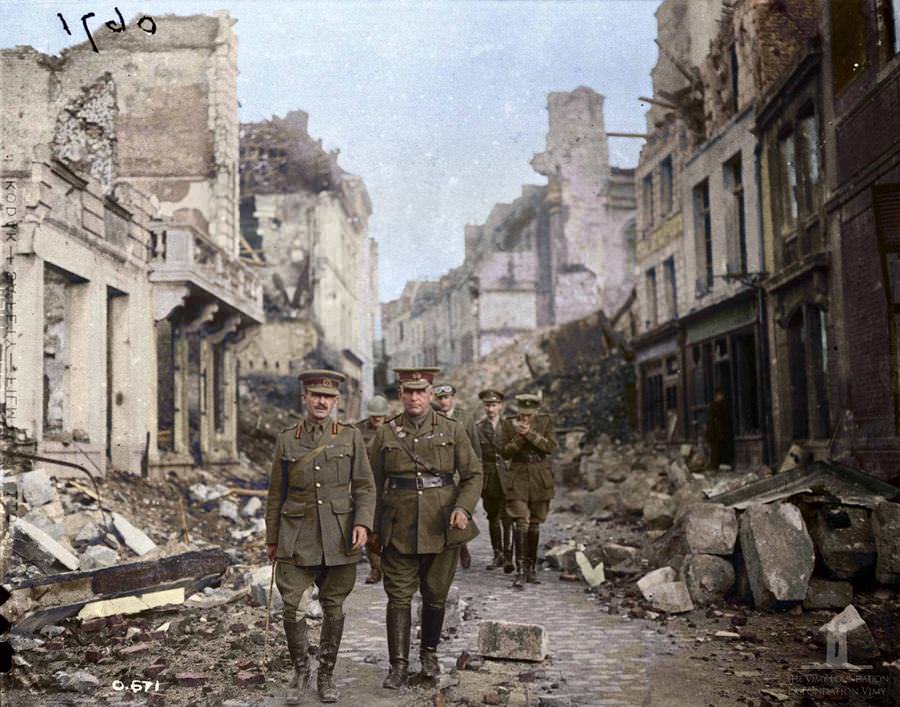 Gen Sir sam hughes and party looking at ruins in arras, August 1916