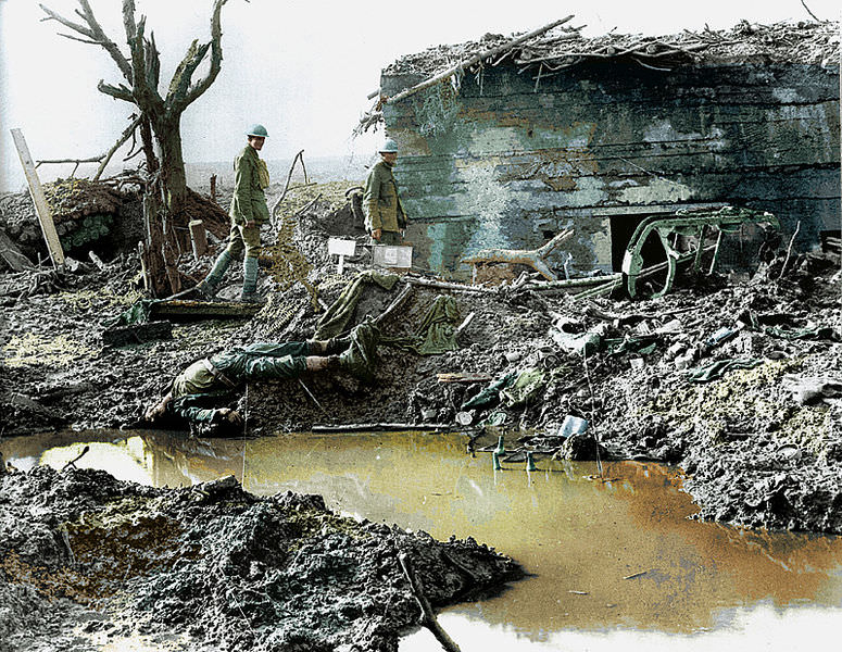 Canadian soldiers survey a destroyed German bunker during the battle of Passchendaele.