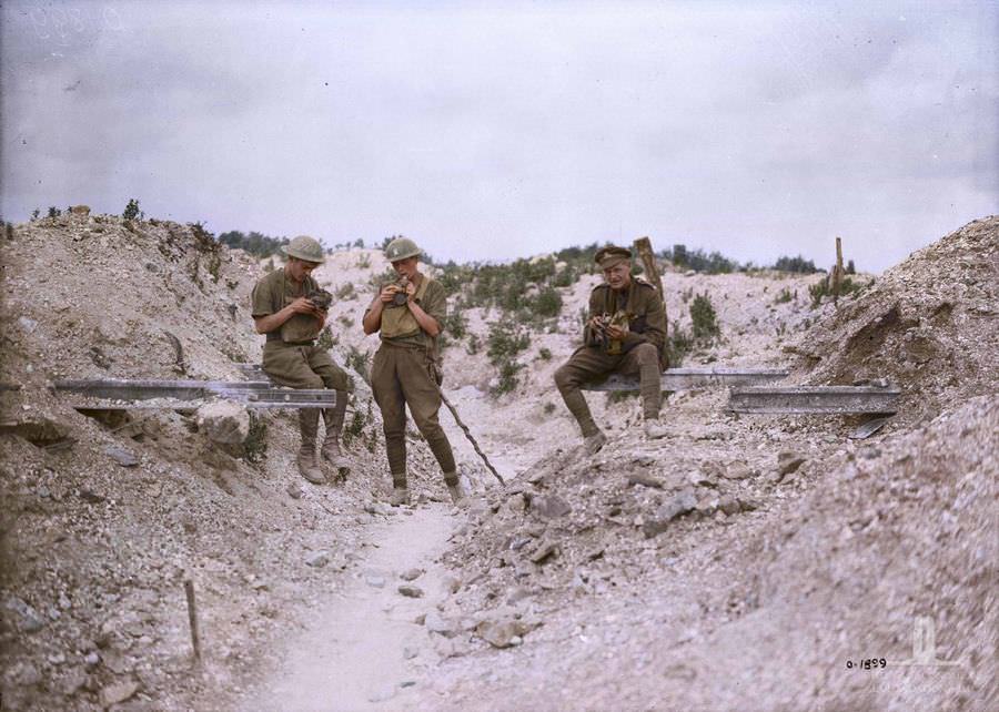 Canadian testing their gas masks after heavy work in the trenches. September 1917