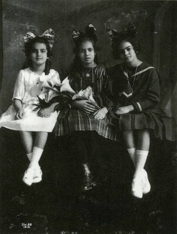 12-years-old Frida on the right with sister Cristina on the left and best friend, Isabel Campos, 1919