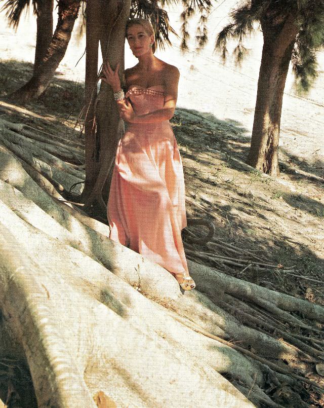 Model in strapless summer evening dress by Adele Simpson, 1947