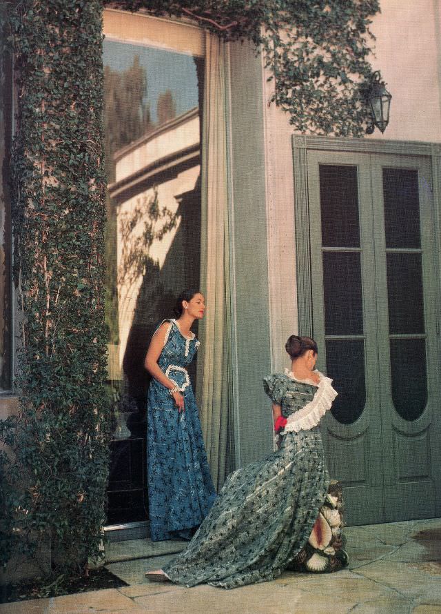 Model in combination sun dress and bathing suit by Cole of California, wired-bra top clamps on to leave back exposed, swimming trunks worn under skirt, 1948