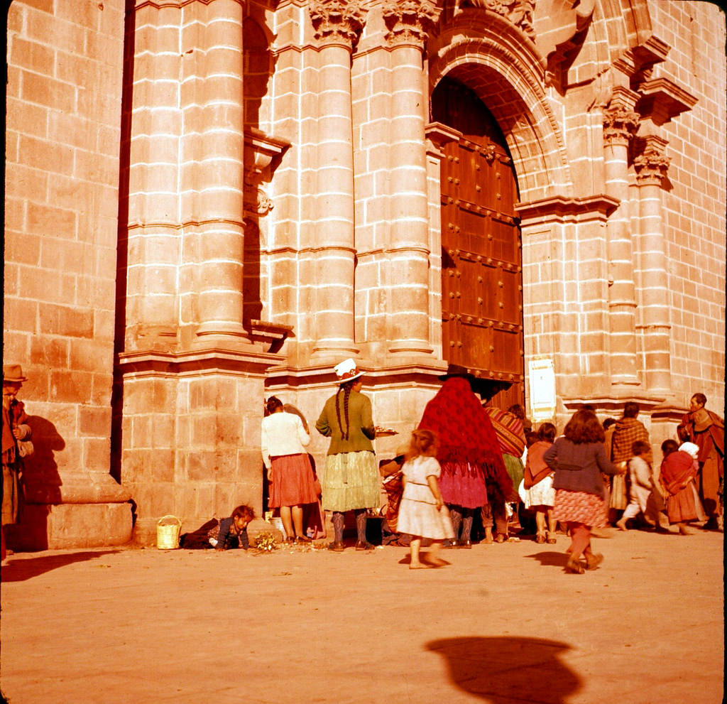 Crowd at the door of church or cathedhral, Cuzco, Peru, 1960