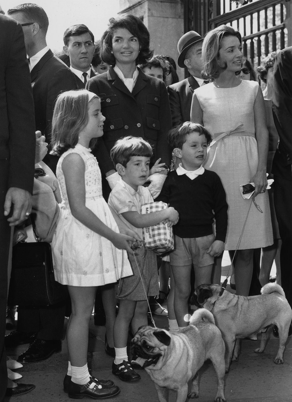Jackie Kennedy and her children with dogs