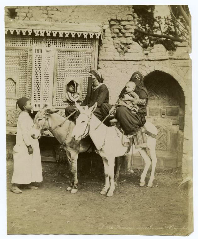 Women riding on their donkeys