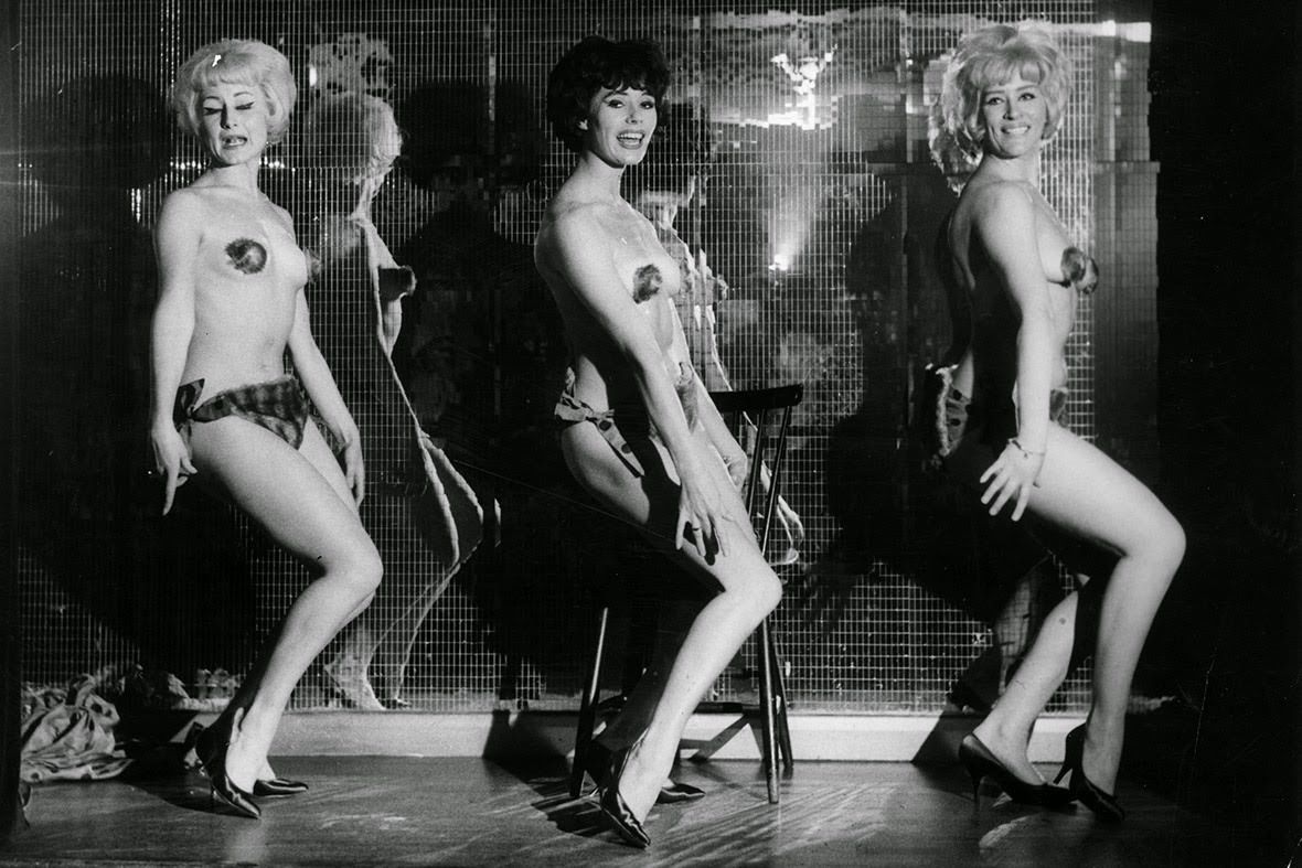 Dressed in minuscule fur bikinis, Kean Fluffles, Angela Parker and Audrey Crane perform in London's Casino de Paris in Soho, 1963