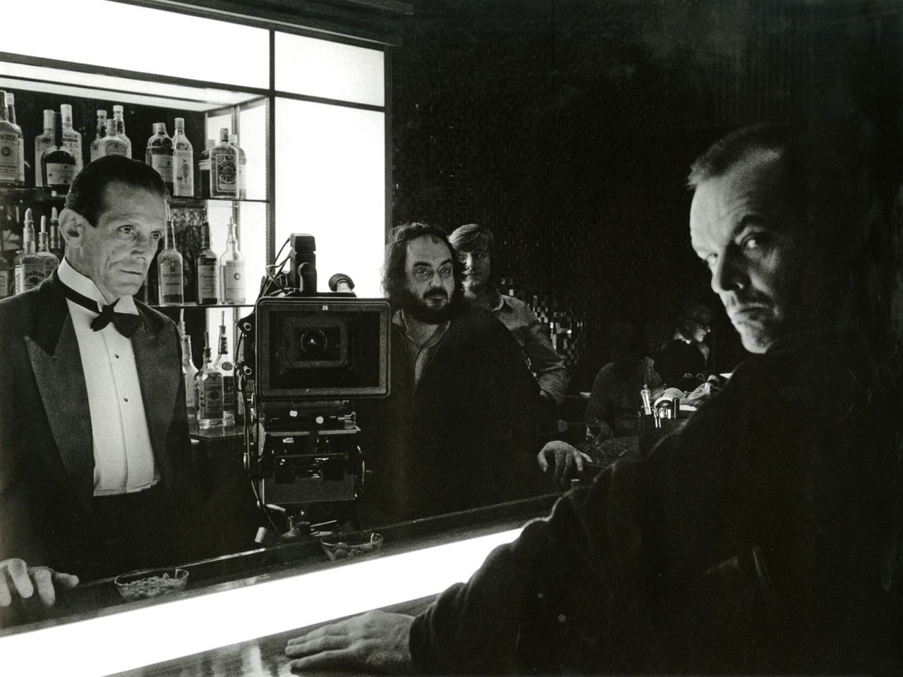 Joe Turkel (Lloyd), Stanley Kubrick, and Jack Nicholson on set.