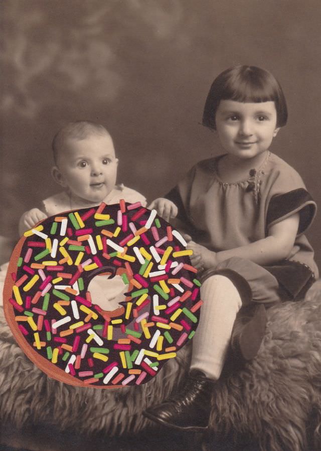 Baby Simon and his sister Simone hold the world's largest doughnut with sprinkles