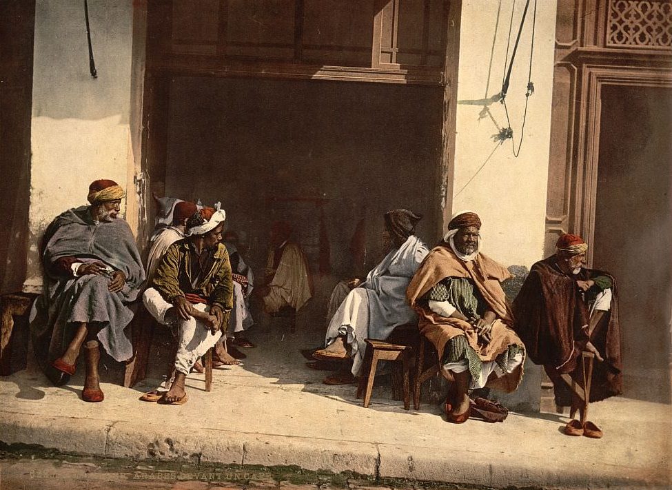 Arabs before a cafe, Algiers, Algeria