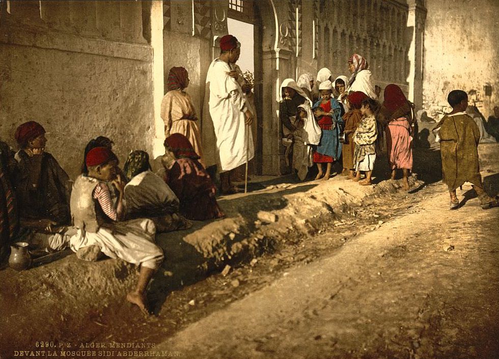 Beggars in front of mosque "Sidi Abderrhaman", Algiers, Algeria